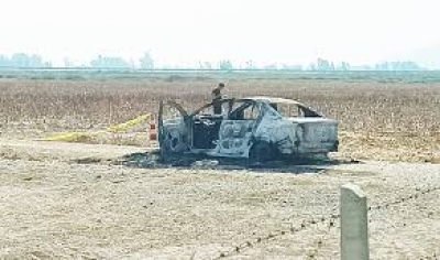 Kozan'da yanmış otomobilde erkek cesedi bulundu